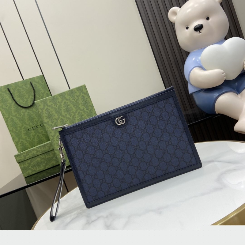 G*u*i clutch bags